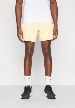 Short de sport - tangerine tint/black