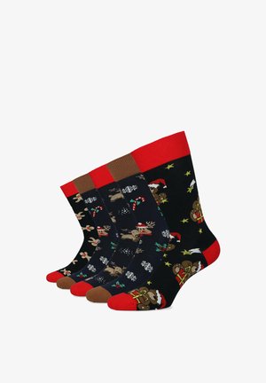 Zestaw skarpetek z festiwalowymi wzorami, przeważnie czarnych z czerwonymi akcentami, przedstawiających renifery, ludki piernikowe i płatki śniegu.