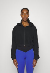 Nebbia WOMEN CROPPED HOODIE - Užtrauktuku užsegamas treningas - black