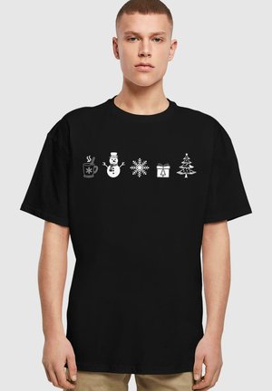 Sort t-shirt med hvide vinter-tema ikoner: en dampende kop, snemand, snefnug, gavekasse og juletræ, med en afslappet pasform.
