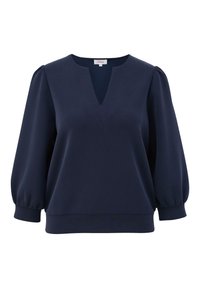 Blouse bleu marine avec manches trois-quarts bouffantes, poignets avec revers et encolure en V avec encoche.