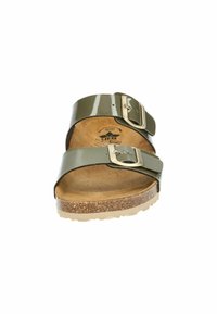 Green patent leather sandal with two adjustable straps, a cork footbed, and a textured rubber sole. Features a silver-tone buckle.