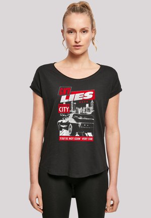 Black short-sleeve t-shirt with a rounded neckline. Features a graphic print of a car and text in red and white. Soft fabric, relaxed fit.