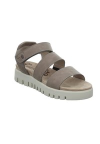 Brown leather sandals with three wide straps, a textured insole, and a chunky light grey sole featuring a ridged pattern.