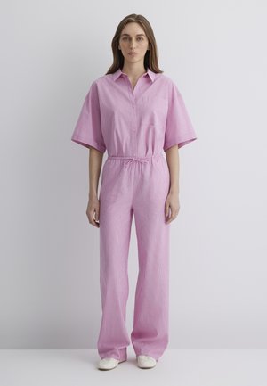 Pink striped jumpsuit with a collared neckline, short sleeves, drawstring waist, and loose-fitting pants. Light, textured fabric.