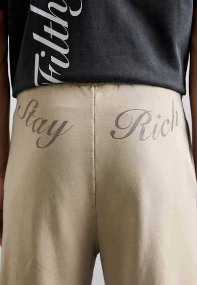 AVAVAV TRACK PANT UNISEX - Pantalones deportivos - beige
