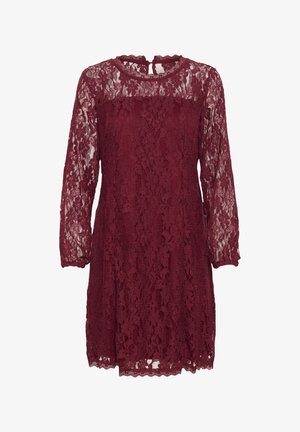 Burgundijas krāsas mežģīņu kleita ar garām piedurknēm, ar viļņotu dekoltē un ziedu rakstiem. Viegls, puscaurspīdīgs audums ar viļņotu apakšmalu.