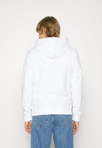 Calvin Klein Jeans SEASONAL MONOLOGO REGULAR HOODIE - Felpa - bright white