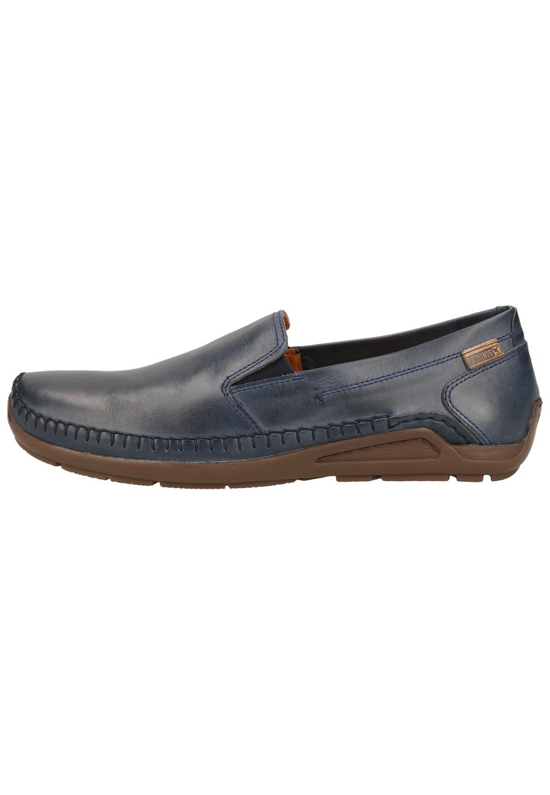 Mørkeblå læder slip-on sko med en brun sål, der har syede detaljer langs fronten og et glat, minimalistisk design.