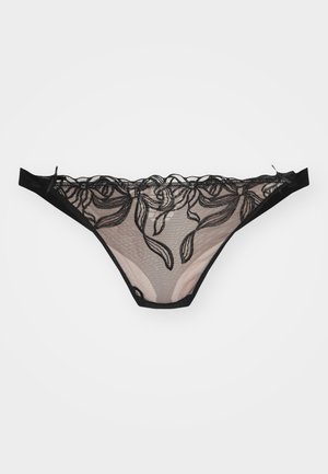 Tanga de renda preta com desenho bordado floral, tecido de malha transparente, bordas em forma de onda e textura suave e lisa; corte minimalista.