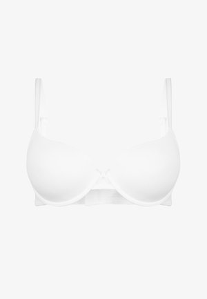 Witte gevoerde beha met verstelbare bandjes, een gladde textuur en een centraal strikdetail. Ontworpen met een naadloze afwerking en traditionele haaksluiting.