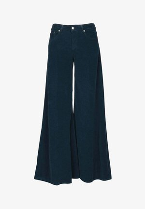 Jeans larges en velours côtelé bleu foncé. Comprend cinq poches et des boutons métalliques, avec une texture lisse et une coupe évasée.