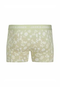 Grüne Baumwoll-Boxershorts mit einem weißen abstrakten Muster und einem passenden Bündchen mit dem "JACK & JONES"-Logo in weißer Schrift.