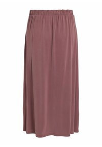 Jupe mi-longue en tissu doux et extensible de couleur rose poudré, avec une taille élastique et une silhouette fluide.