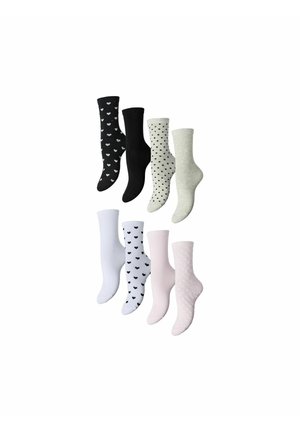 Huit paires de chaussettes mi-mollet en noir, blanc, beige et rose avec des motifs en forme de cœur et de pois, disposées en deux rangées.