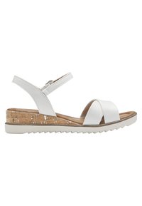 White leather sandals with a strappy design, cork wedge heel, textured accents, and rubber sole featuring a zigzag tread pattern.