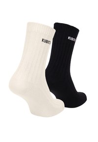 Prążkowane białe i czarne skarpetki bawełniane, z logo "KUBOTA" w kontrastowym kolorze. Wyjątkowy teksturowany materiał i kształt.