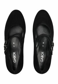 Zapatos Mary Jane de ante negro con punta redonda, correas ajustables con hebilla y una plantilla de cuero suave. Diseñados por Gabor.
