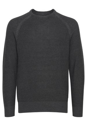 Tumehall villane kampsun, millel on tekstuuriga kudumismuster, ümmargune kaelus ja ribakudumisega mansetid ning ääred. Omab raglaanvarukaid, mis tagavad liikumisvabaduse.