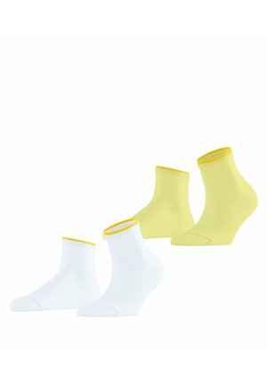 Due paia di calzini alla caviglia, uno bianco e uno giallo, ciascuno con un sottile bordo giallo al polsino, mostrati su modelli di piedi invisibili.