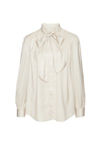 Blusa di seta color crema con un grande fiocco al colletto, chiusura con bottoni e maniche lunghe a sbuffo. Tessuto liscio con una vestibilità rilassata.