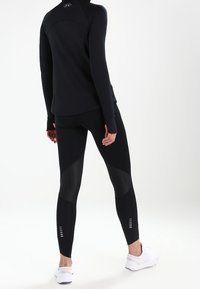 Under Armour Sports T-shirt - black