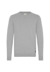Light grey sweater made of a soft textile, featuring a crew neck, long sleeves, and ribbed cuffs and hem. Subtle brand tag at the bottom.