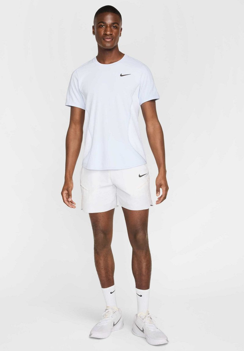 Nike Performance Sport T-shirt lichtgrijs Nike Performance Sport T-shirt lichtgrijs