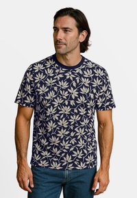 Korte mouw navy t-shirt met een licht beige bloemenpatroon, ronde halslijn en een regular fit, gemaakt van katoen.