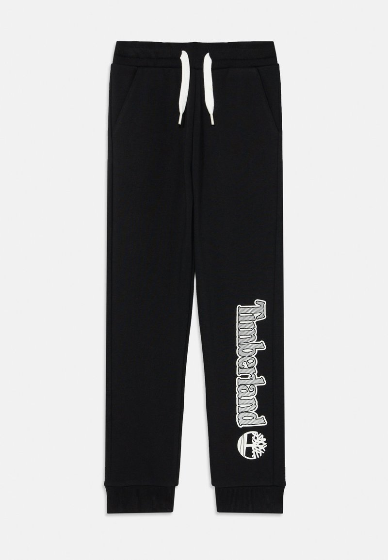 Svarta träningsoveraller med vit dragsko, elastisk midja och sidofickor. Har "Timberland"-logotypen i vitt längs vänster ben.