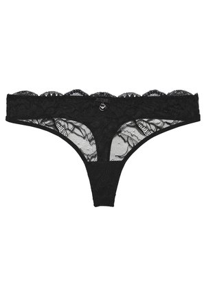Black lace thong with scalloped edges, floral patterns, and sheer mesh panels. Features a small central accent detail. Soft texture.