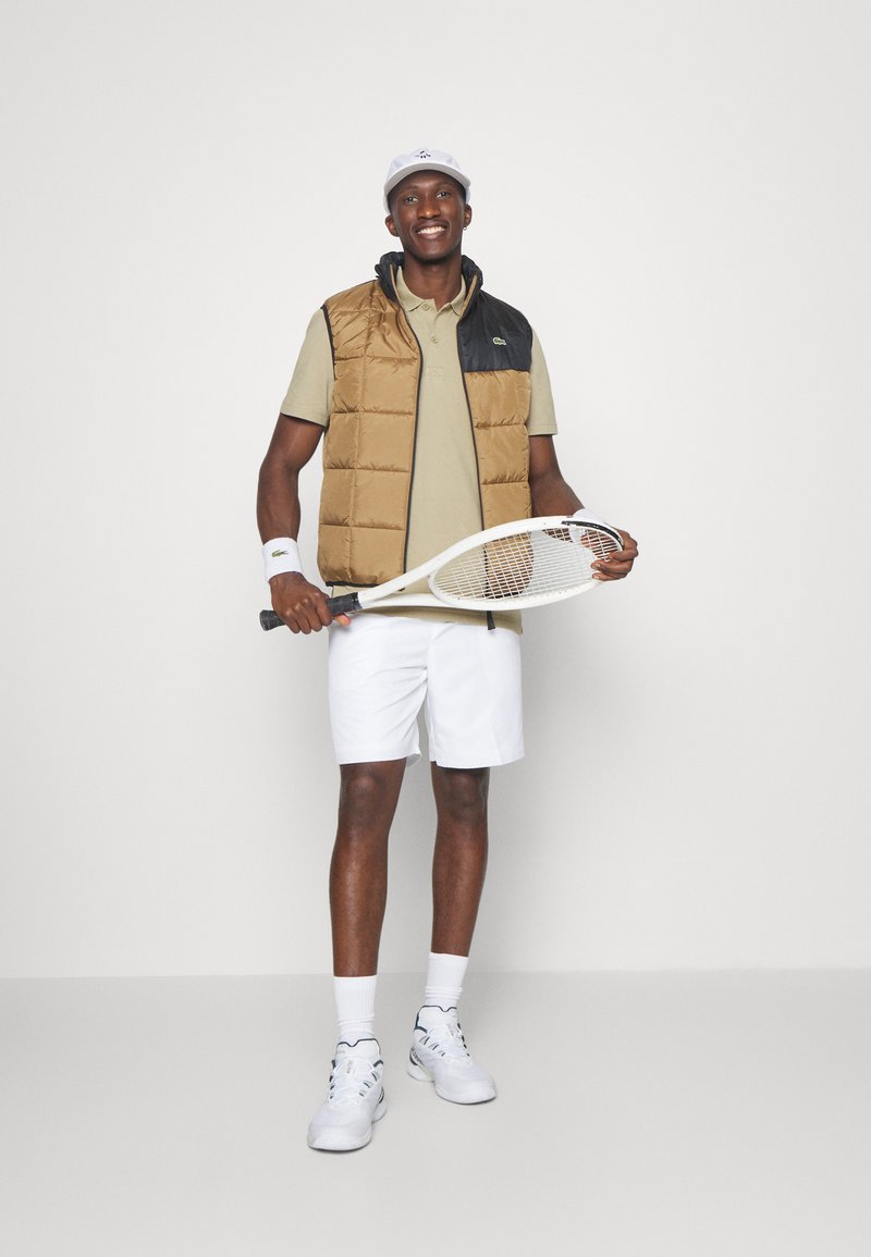 Lacoste Sport Bodywarmer zandkleur