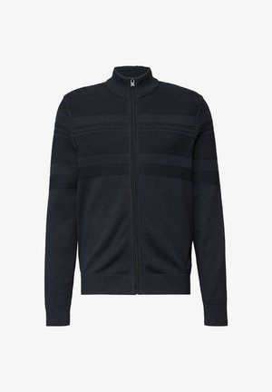 Marineblauer Strickpullover mit Reißverschluss, gefertigt aus Strickstoff, mit strukturierten Streifenmustern, hohem Kragen und enganliegenden Bündchen. Glatte Textur mit lockerer Passform.