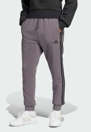 adidas Sportswear ESSENTIAL 3-STRIPES - Tracksuit bottoms - grey strata black