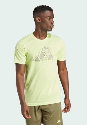 adidas Performance ESSENTIALS jasnozielony