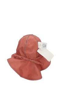 Baumwollbucket-Hut in Koralle mit breiter Krempe, genähten Details und verstellbarem Bindeband an der Rückseite. Enthält ein angehängtes Pflegeetikett.