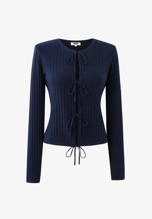 Navy ribbed knit cardigan with a round neckline, front ties, long sleeves, and a fitted design. Textured fabric and subtle sheen details.