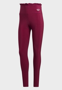 Högmidjade, djupröda träningsleggings med elastisk midja och liten vit Adidas-logotyp på vänster sida.
