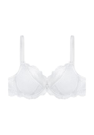 Biały koronkowy stanik z formowanymi miseczkami, falbaniastymi krawędziami, regulowanymi ramiączkami i centralnym zapięciem na hak. Delikatny wzór kwiatowy na całej powierzchni.
