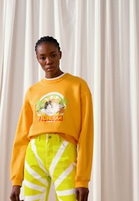 Fiorucci SUNWASH STROBES TARA - Calças de ganga justas - yellow