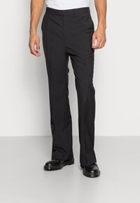 Weekday FRANKLIN FLARED TROUSERS - Calças - black