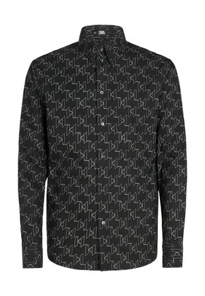 Camisa negra de manga larga con un patrón geométrico en blanco con formas variadas, cierre de botones en la parte delantera y un diseño clásico de cuello.