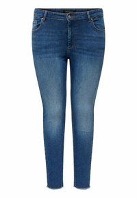Jean skinny en denim bleu moyen, avec un design à cinq poches, un léger décoloration et un ourlet effiloché à la cheville pour un détail supplémentaire.