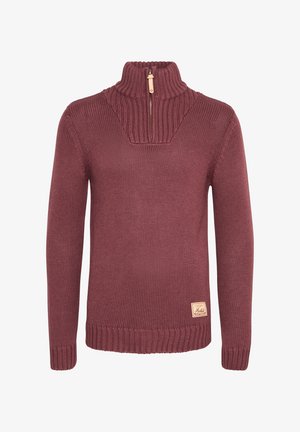 Pulover tricotat burgundy cu un guler înalt, striat, fermoar scurt și patch cu logo. Prezintă un design texturat, cu tricotaj gros.