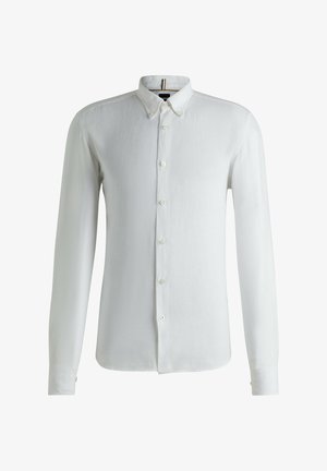 Camicia bianca a maniche lunghe realizzata in tessuto leggero, con colletto button-down, chiusura frontale con bottoni e una leggera texture.