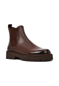 Bruine leren Chelsea-boot met elastische zijpanelen, een gestructureerde zool en een robuust, chunky ontwerp. Beschikt over een gladde en glanzende afwerking.