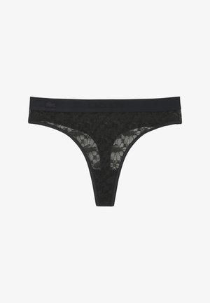 Perizoma in pizzo nero con motivo floreale. Presenta una fascia in vita nera unita con il logo Lacoste in rilievo. Texture leggera e delicata.