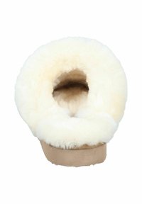 Sheepskin slipper with a soft, fluffy cream-colored interior and tan suede exterior. Designed with a rounded shape and cushioned sole.
