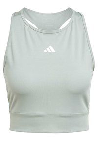 Top deportivo corto verde claro con una textura suave, que presenta un logotipo de Adidas en blanco y detalles recortados en los hombros.