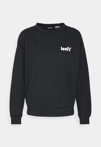 Sweatshirt noir en coton, doté d'un col rond, de manches longues, et d'un petit logo blanc Levi's sur la poitrine.